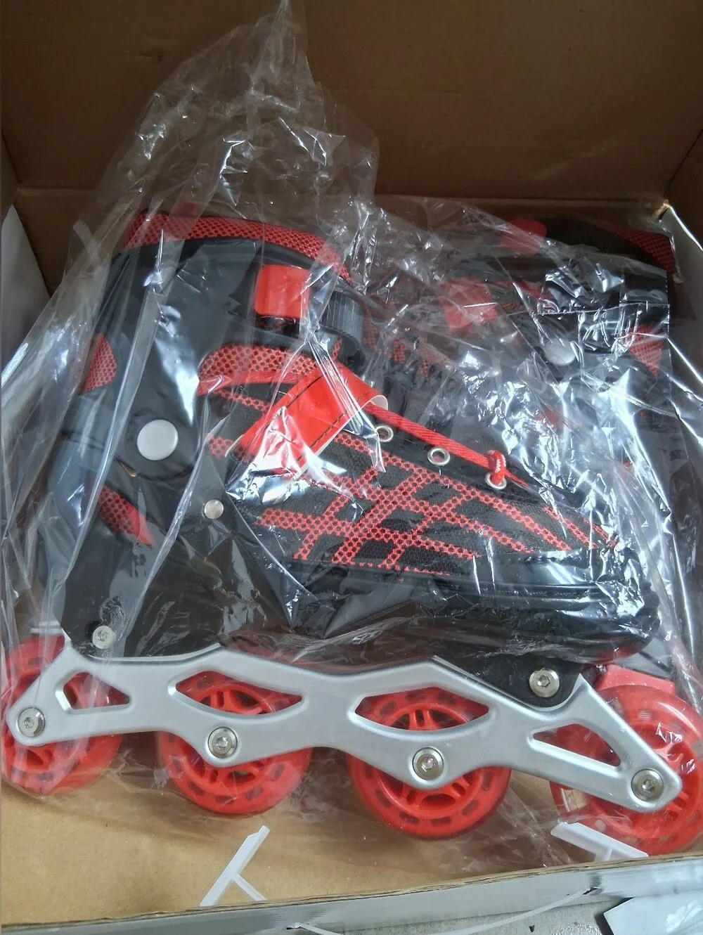 NIB-Youth Red and Black Adjustable Inline Roller Skates